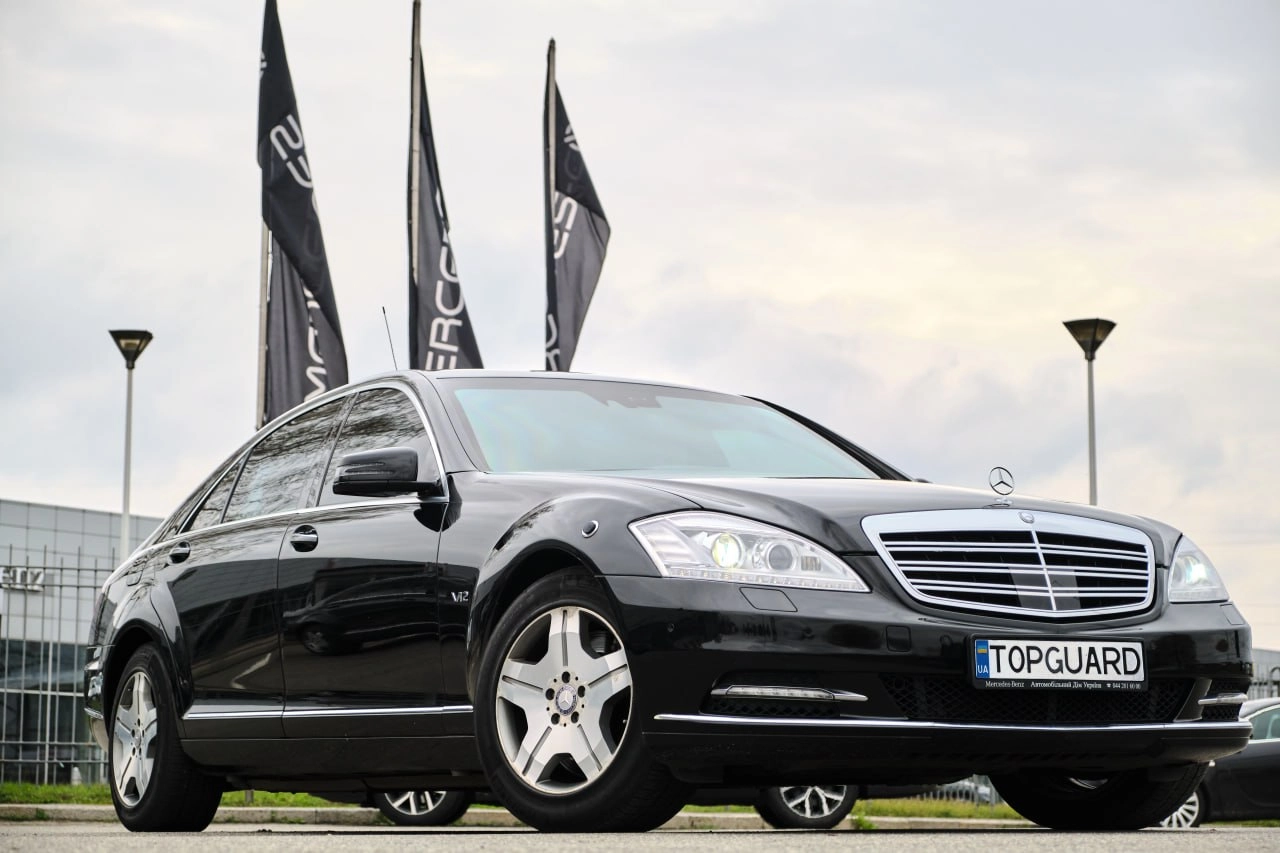 Escort with armed bodyguards and armored vehicles armed bodyguard escort, armored vehicles, personal security, TopGuard Security